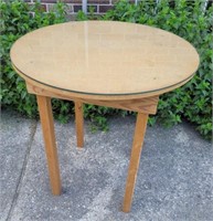 Homemade round wooden table with glass top. 29×27