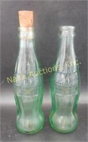 2 Coke bottles