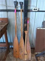 Pair of wooden boat oars, 2 other wooden oars