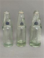 Trio of Star Brand Codd Soda Bottles