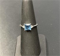 10 KT Blue Topaz and Diamond Ring