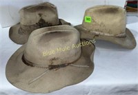 3 old work hats