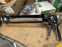 HUSKY COCKING GUN RETAIL $30