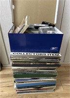 Large group of records and cassettes mostly