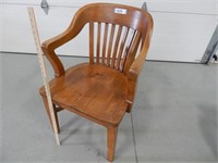 Antique wooden captain's chair