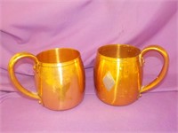 2 West bend copper mugs
