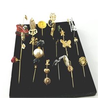 Large set of pins, several dozen included, in vari