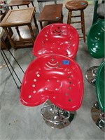 (2) red hydraulic actuated tractor seats.