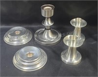 Pewter tapered candle holders.