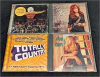 4 Compact Discs Garth Brooks LeAnn Rimes Bonnie Ra