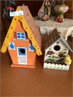 Two wood birdhouses 6 inch and 9 inch
