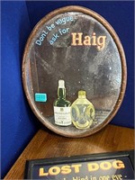 Original Oval Haig Advertising Mirror and a