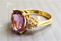 18k gold ring set with oval amethyst & 6 diamonds: