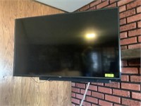 55 in. Vizio flat screen TV, w/ sound bar