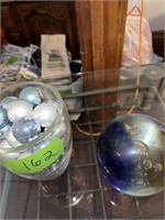 Glass Ball and vase with christmas ornaments