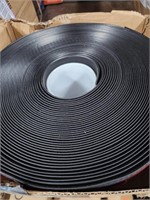 Solid rubber strip with adhesive