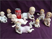 8 Bisque Piano Babies sizes vary, look at