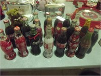 21 COKE BOTTLES