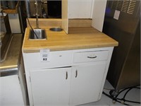 Wooden counter with Formica Top with water spout