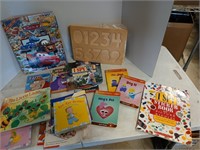 Large box of assorted kids books, puzzles