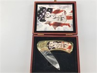 Folding knife showing Mt. Rushmore in original box