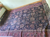 Fringed carpet- showing wear- 208” x 110”