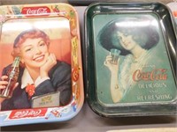 Two Coca Cola trays, Redhead in blue hat w/feather