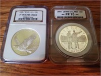 2 Silver dollars. 2008 Bald eagle, 2004 Lewis and