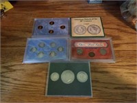 Lot of 5 coin sets.