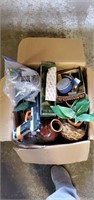 Box of pins, nerf gun, vases , fake plants and