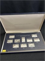 Ten Franklin Mint Sterling Silver Postage Stamps