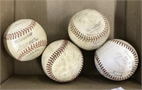 4 baseballs - one is signed (by Oregon HS team?)