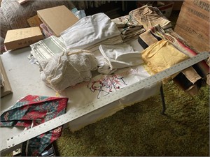 Assorted table cloths , etc.