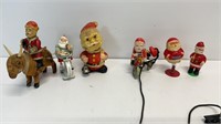 Vintage wind-up and bobble headed Santa toys