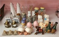 Shelf lot of misc salt and pepper shakers