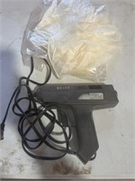 Glue gun & bag of rubber gloves