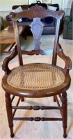 Lovely carved chair w cane seat