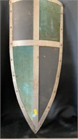 Metal Shield, approximately 16x36 inches