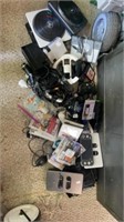 Box full of Video Game Accessories Unsure if any