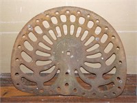 antique farm implement cast iron seat