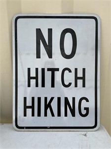NO HITCH HIKING SIGN