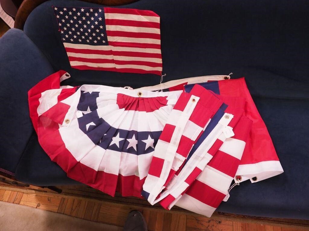 Three American display flags and two