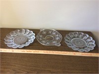 2 deviled egg plates and glass trays