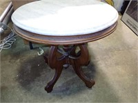 OVAL MARBLE TOP STAND  23 X 21 TALL
