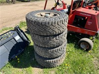 4-Good Year Wrangler LT285/70R 17 tires and rims