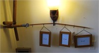 Figural fishing rod frame holder with (3) frames