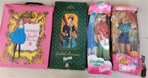 GROUP OF BARBIES AND CASE