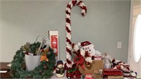 4 tall candy canes, snowman, lights, bags, Santa,