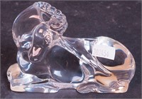 A crystal unicorn paperweight marked
