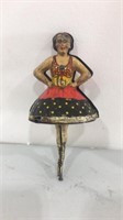 Marx ballerina tin toy.  The 2 sides of